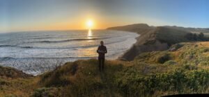 Abigail on hill overlooking ocean